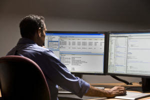 SmartSystems Operator working on computer